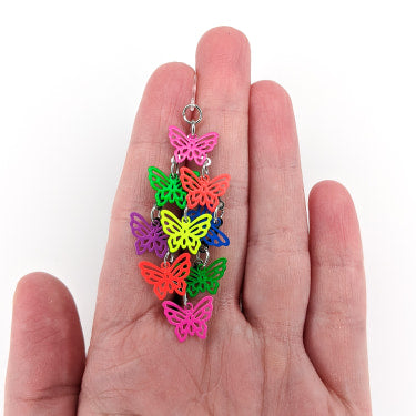 Cascading Butterfly Earrings (Dangles) - neon - size comparison hand