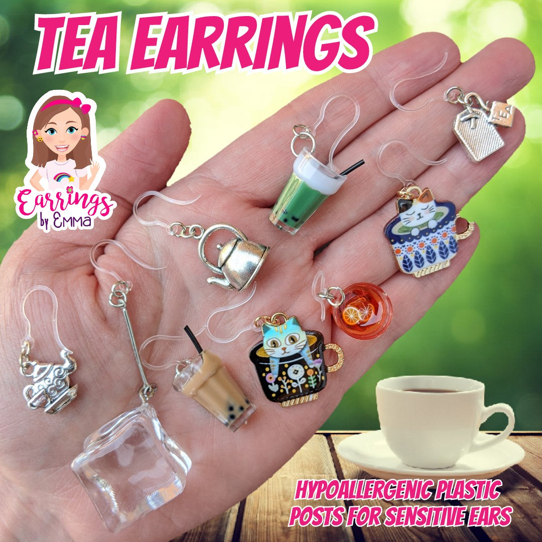 Tea Kettle Earrings (Dangles) - size comparison hand
