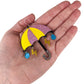 Exaggerated Umbrella Earrings (Dangles) - size comparison hand