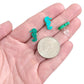 Glitter Seahorse Earrings (Studs) - size comparison quarter & hand
