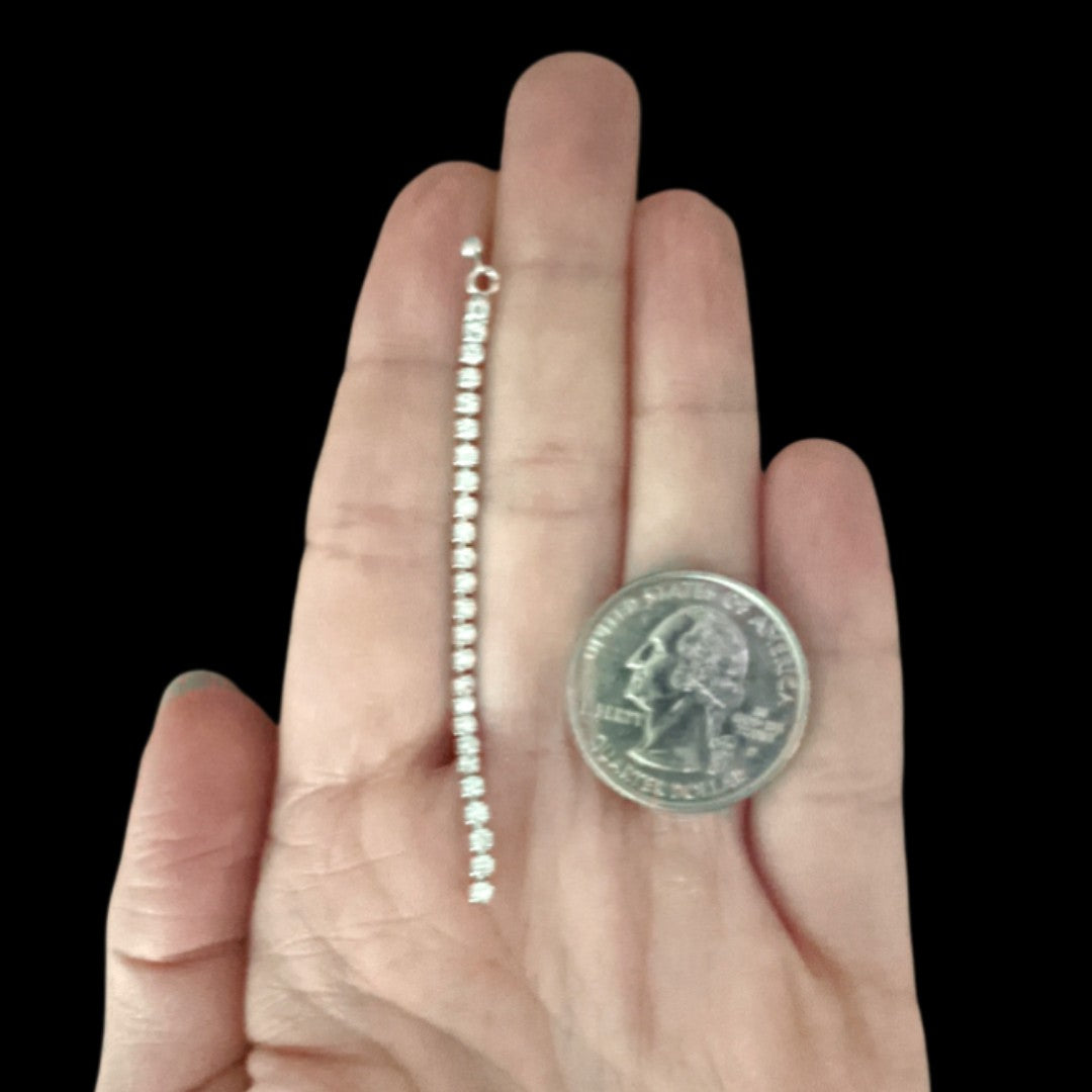 Faux Diamond Drip Earrings (Dangles) - size comparison quarter & hand
