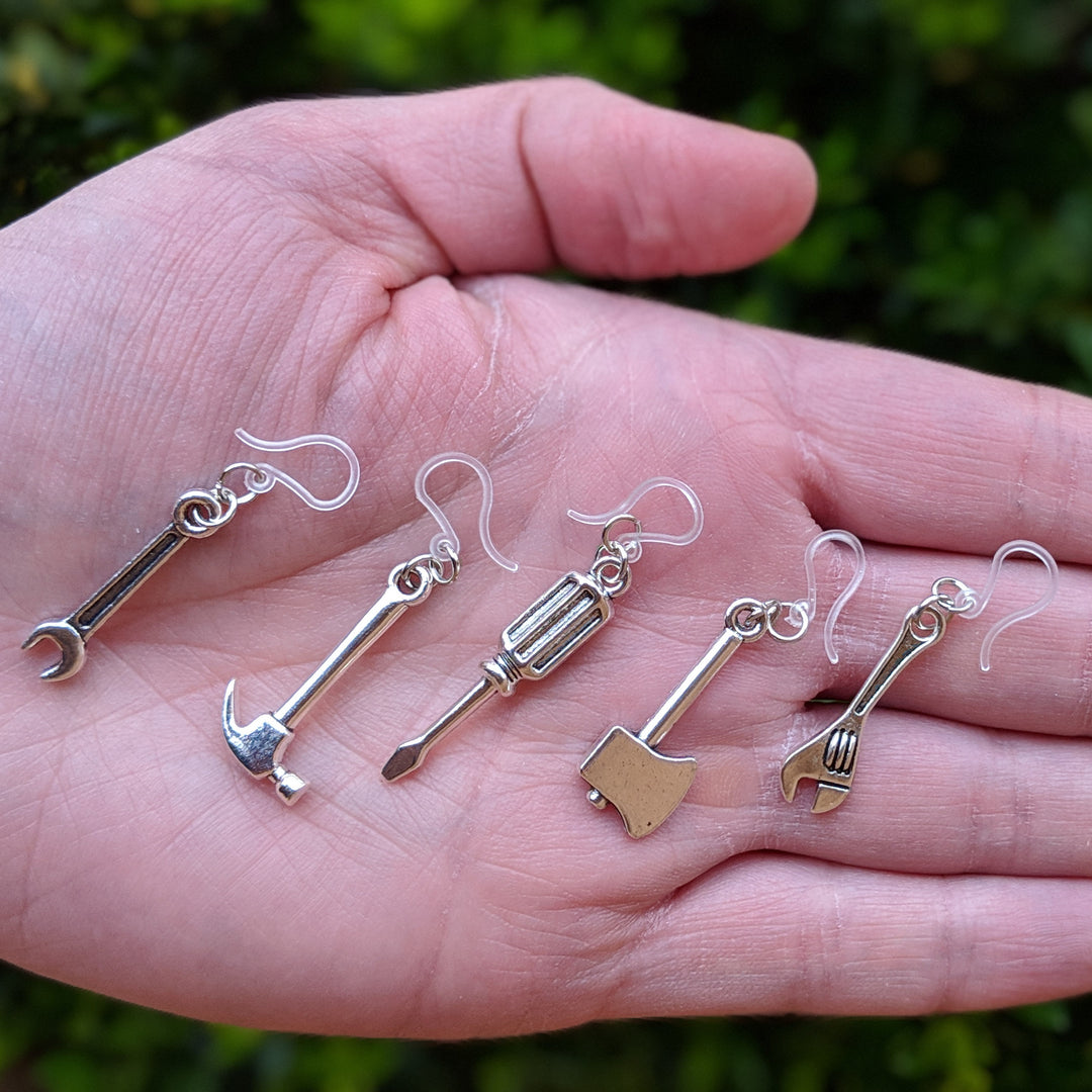 Monkey Wrench Earrings (Dangles) - size comparison hand