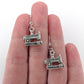 Silver Sewing Machine Earrings (Dangles) - size comparison hand