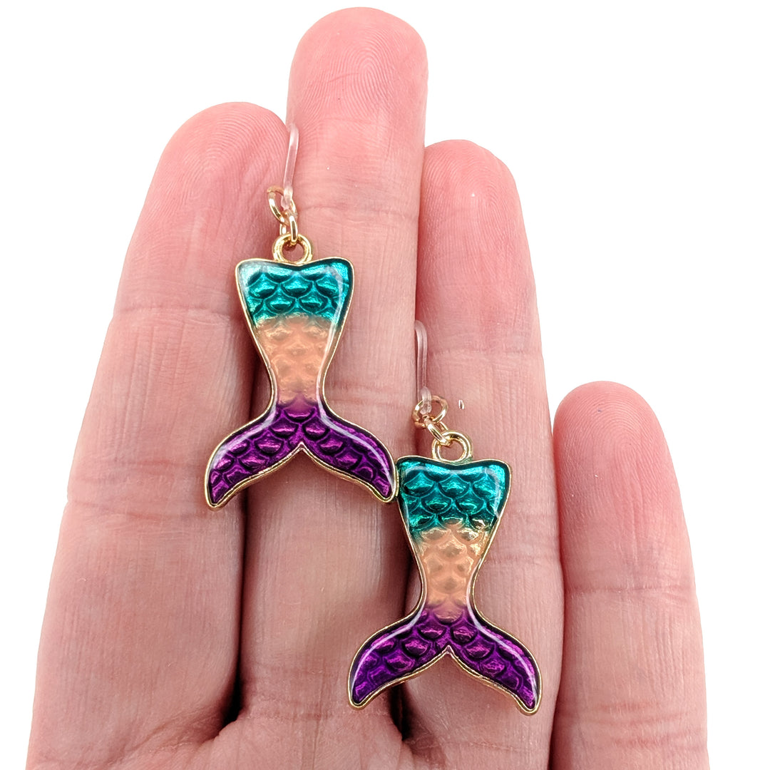Striped Mermaid Tail Earrings (Dangles) - size comparison hand