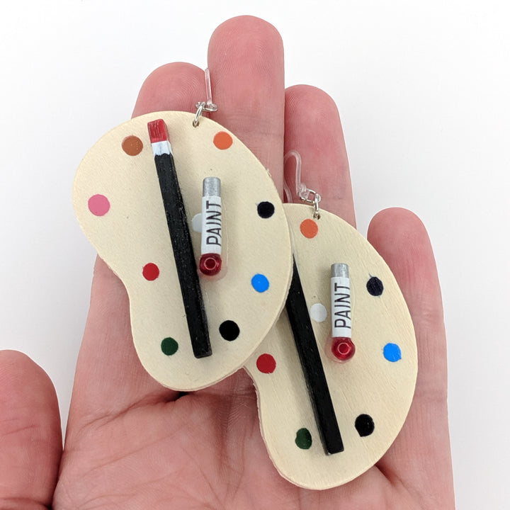 Exaggerated Wooden Paint Palette Earrings (Dangles) - size comparison hand