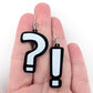 Punctuation Earrings (Dangles) - size comparison hand