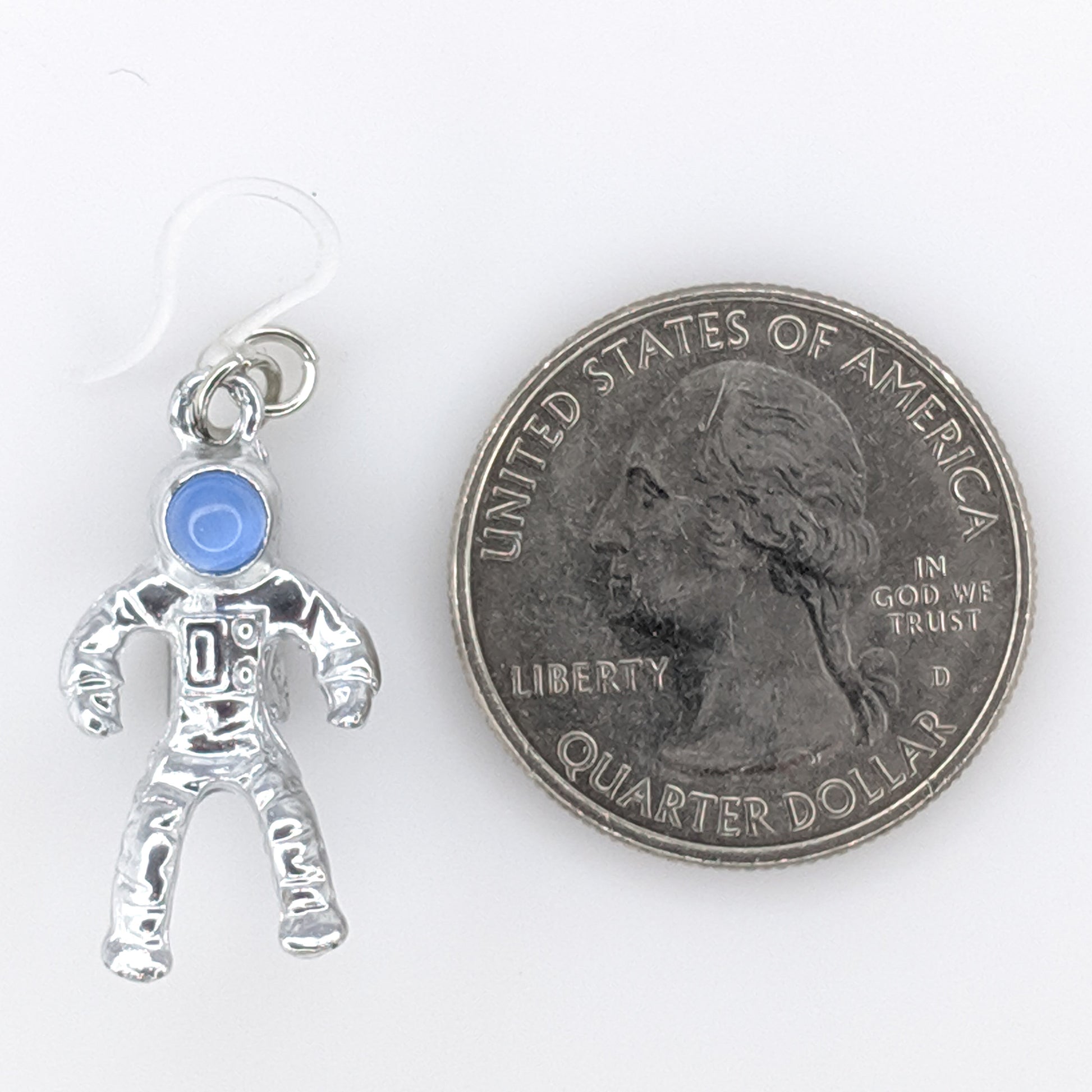 Metallic Astronaut Earrings (Dangles) - size comparison quarter