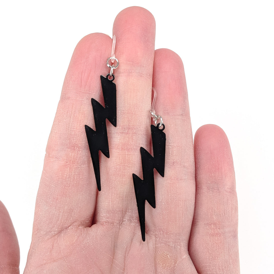 Lightning Bolt Earrings (Dangles) - size comparison hand