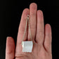 Toilet Paper Earrings (Dangles) - regular -size comparison hand