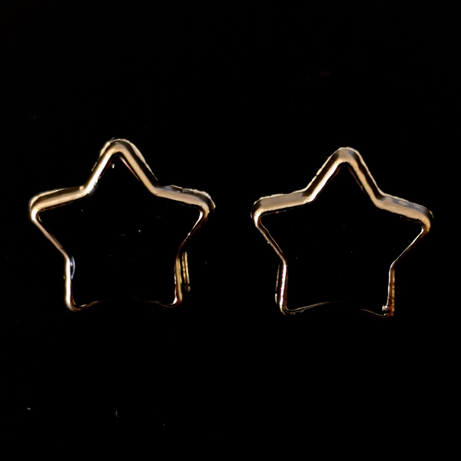 Gold Rimmed Star Earrings (Studs) - black