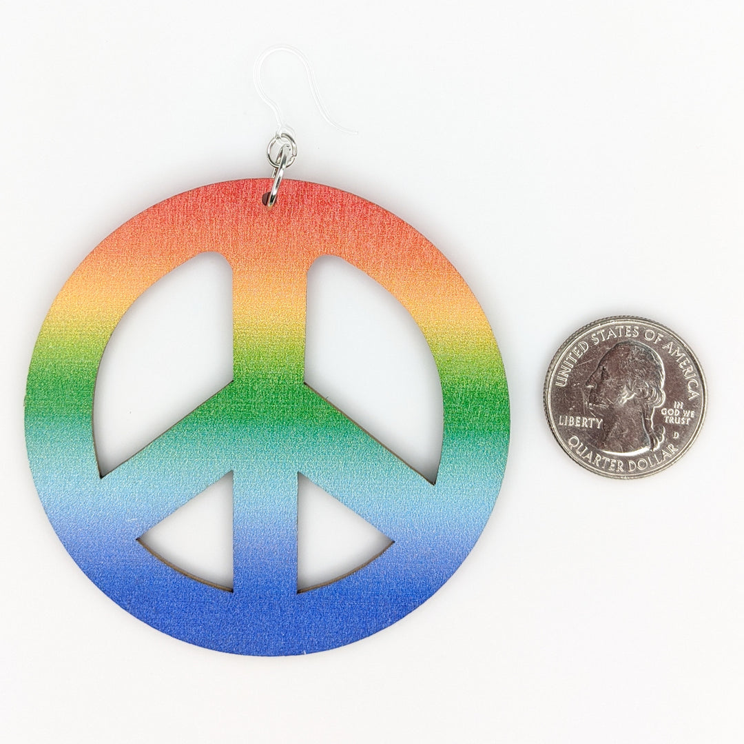 Exaggerated Peace Earrings (Dangles) - size comparison quarter