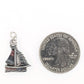 Silver Sailboat Earrings (Dangles) - size comparison quarter