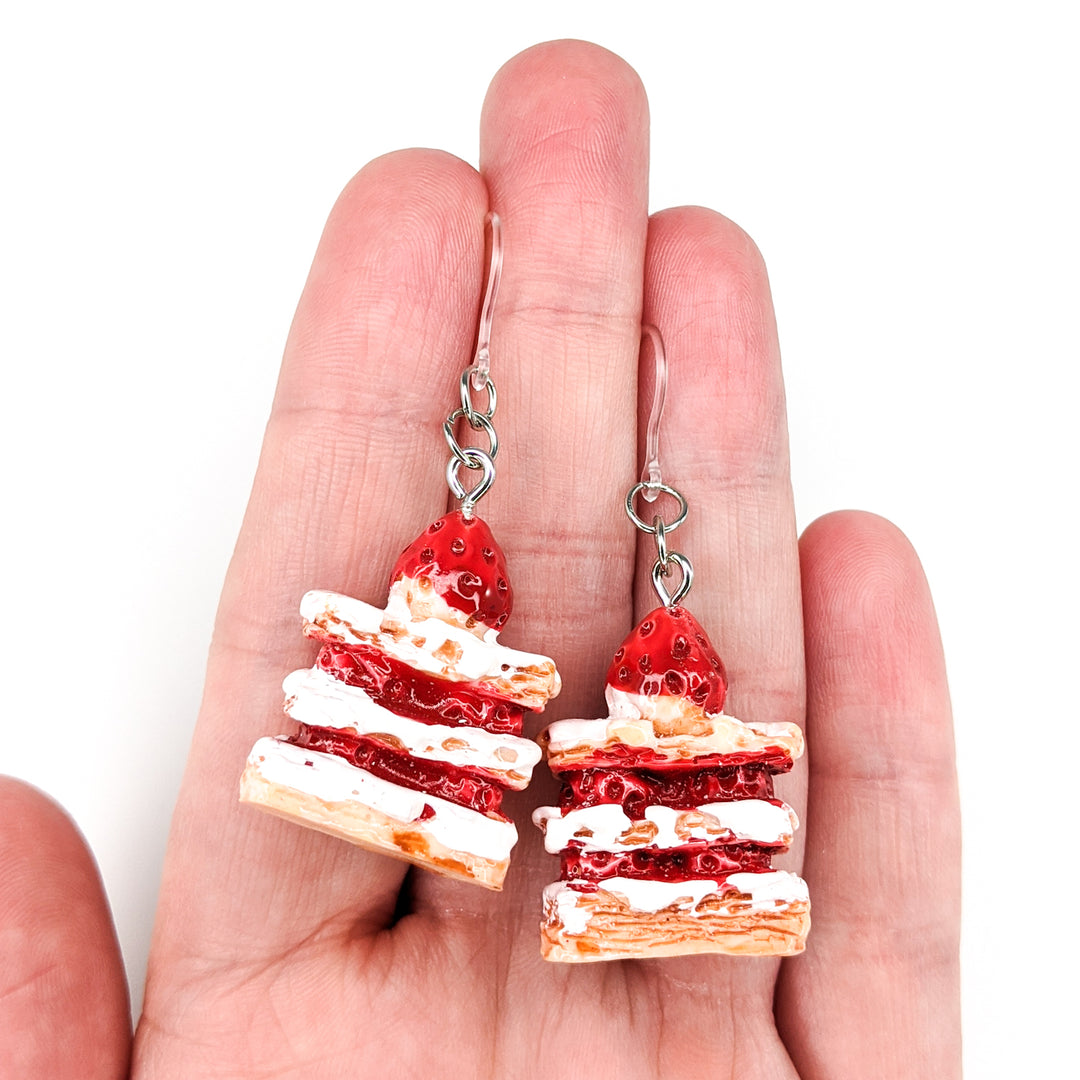 Strawberry Shortcake Earrings (Dangles) - size comparison hand