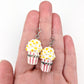 Popcorn Earrings (Dangles) - size comparison hand