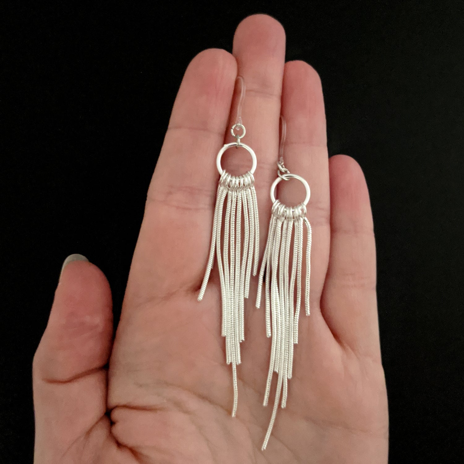 Silver Hoop Rope Earrings (Dangles) - size coparison hand
