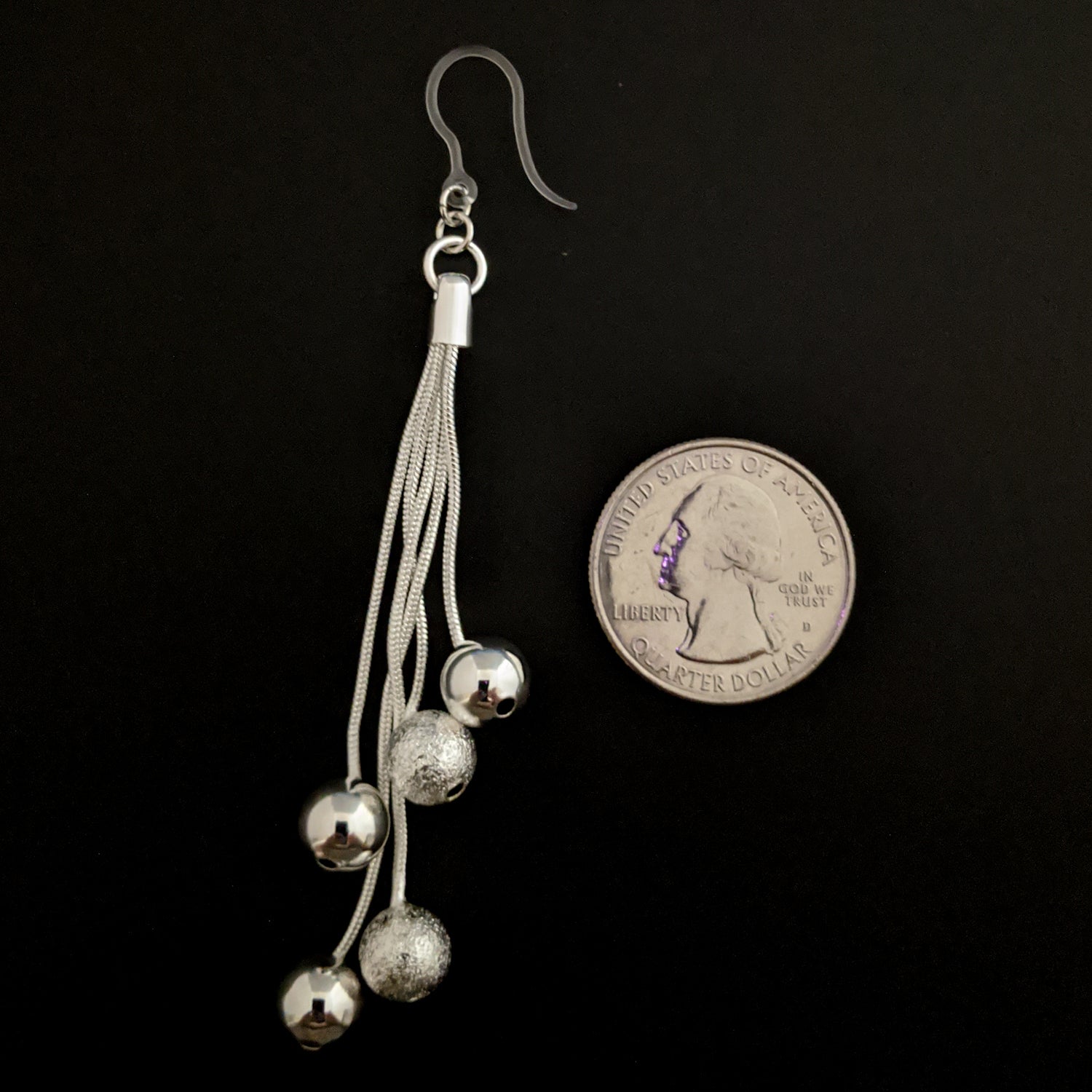 Silver Rope Ball Earrings (Dangles) - size comparison quarter