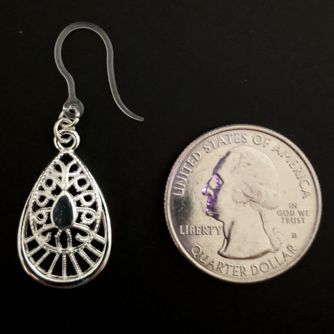 Silver Decorative Teardrop Earrings (Dangles) - size comparison quarter
