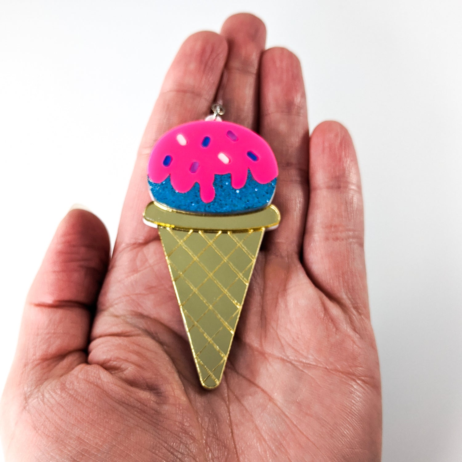 Exaggerated Ice Cream Earrings (Dangles) - size comparison hand