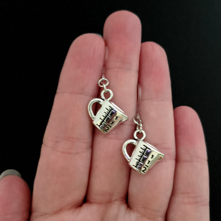 Measuring Cup Earrings (Dangles) - size comparison hand