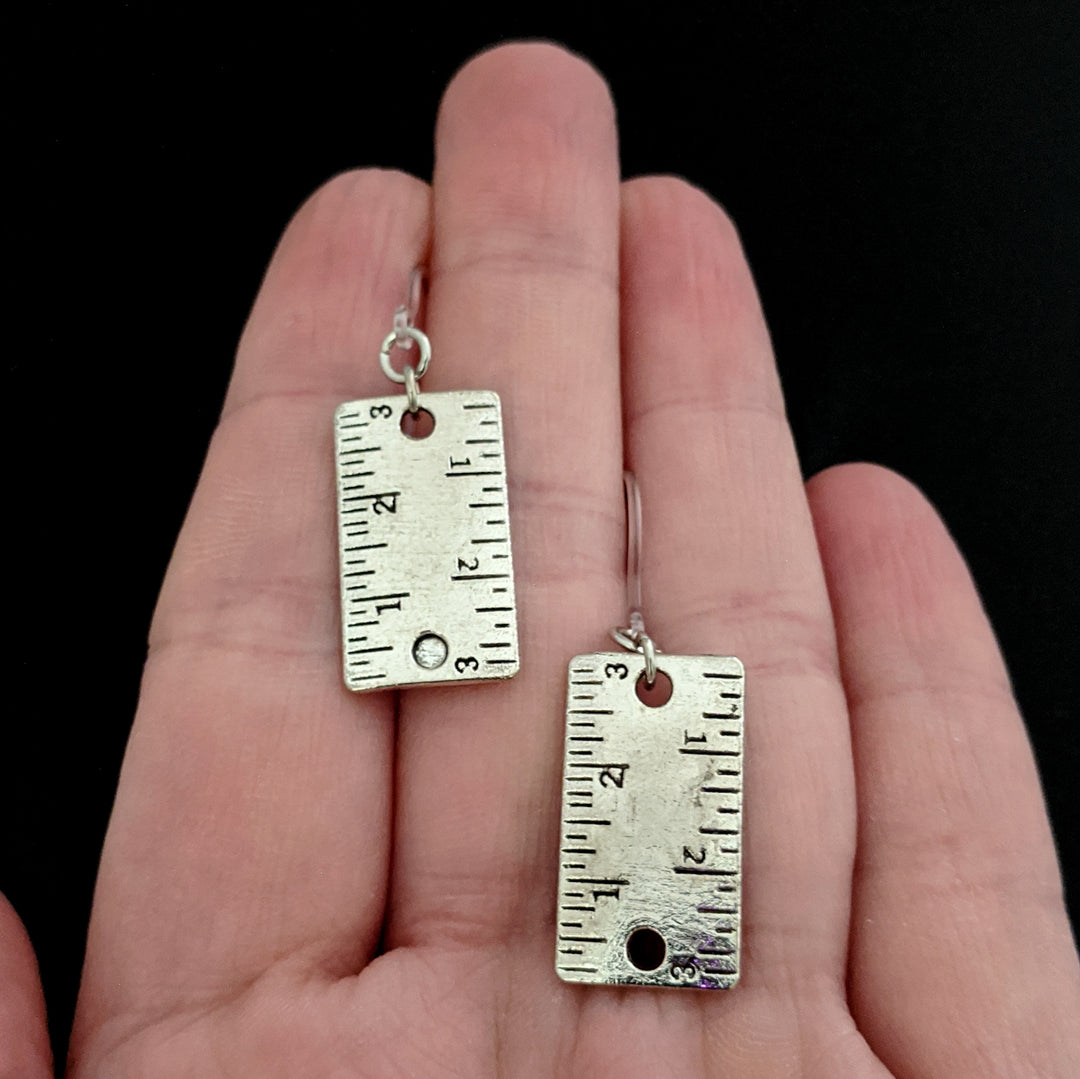 Silver Ruler Earrings (Dangles) - size comparison hand