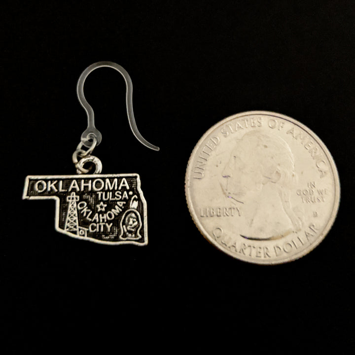 Silver Oklahoma Earrings (Dangles) - size comparison quarter