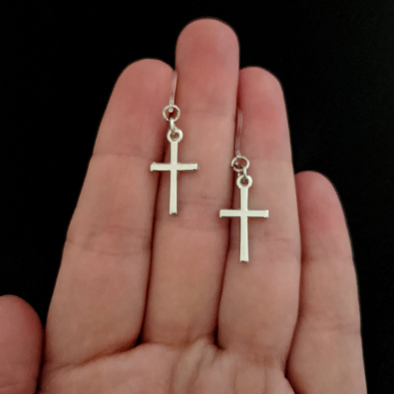 Simple Cross Earrings (Dangles) - size comparison hand