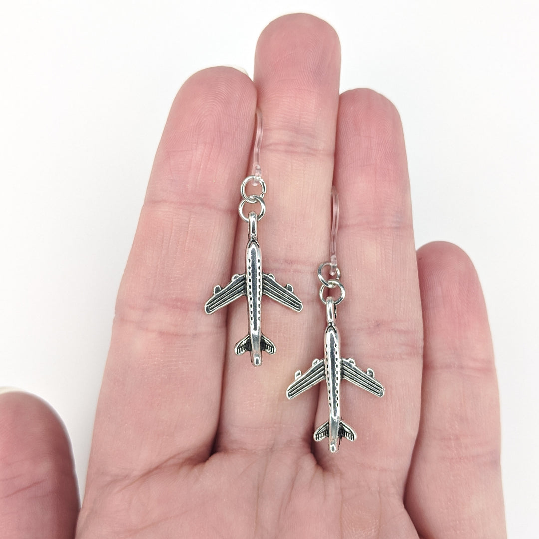 Airplane Earrings (Dangles) - size comparison hand