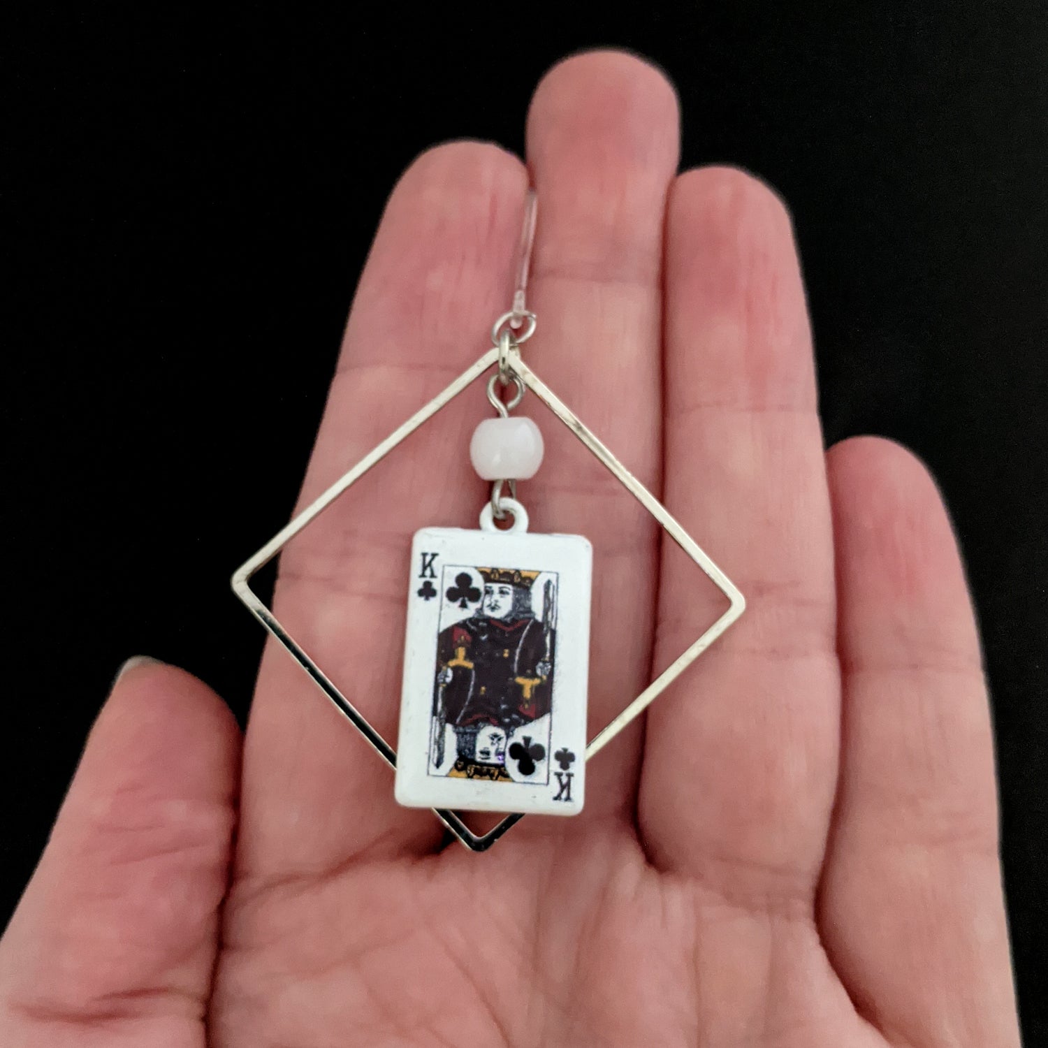 Decorative Playing Card Earrings (Dangles) - size comparison hand