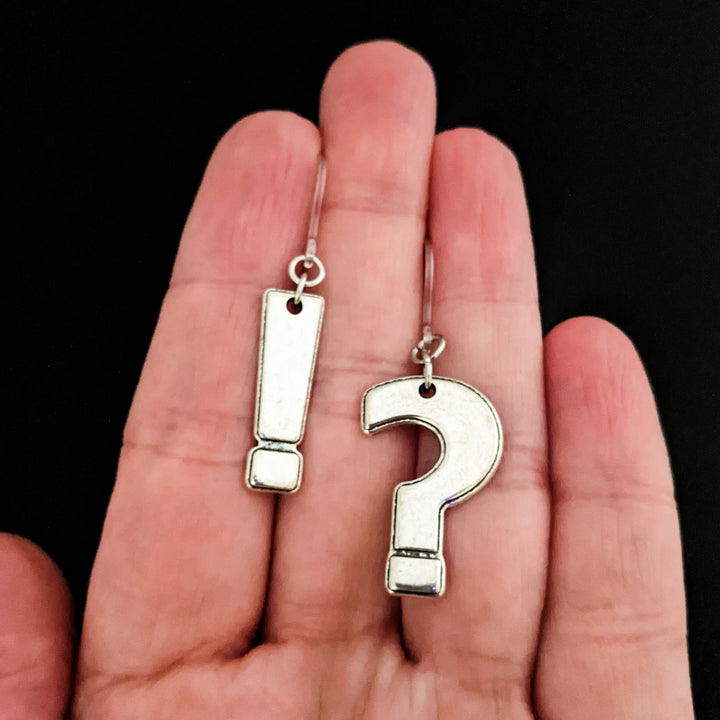 Silver Punctuation Earrings (Dangles) - size comparison hand