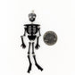 Exaggerated Skeleton Earrings (Dangles) - size comparison quarter