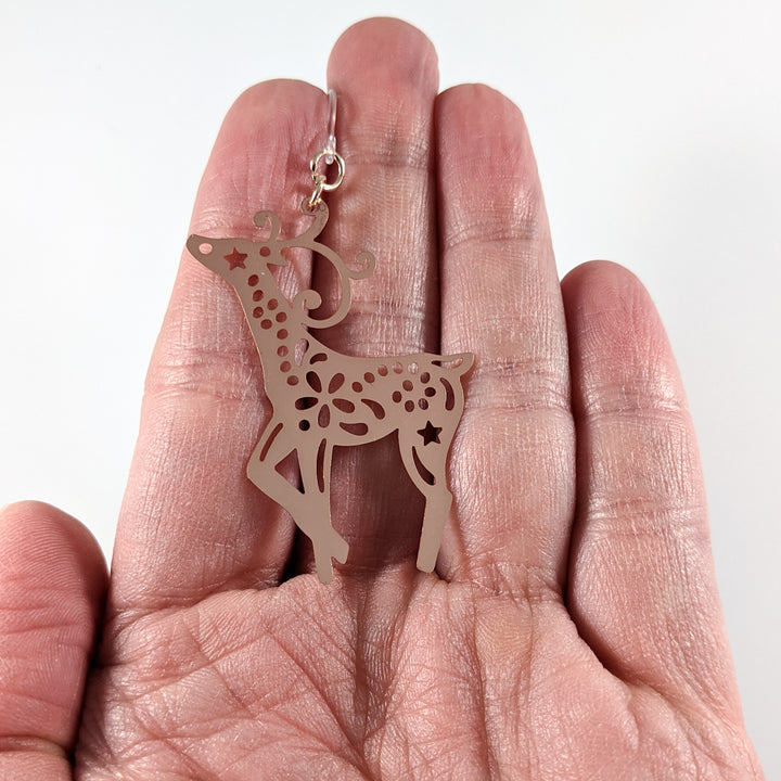 Large Reindeer Earrings (Dangles) - size comparison hand