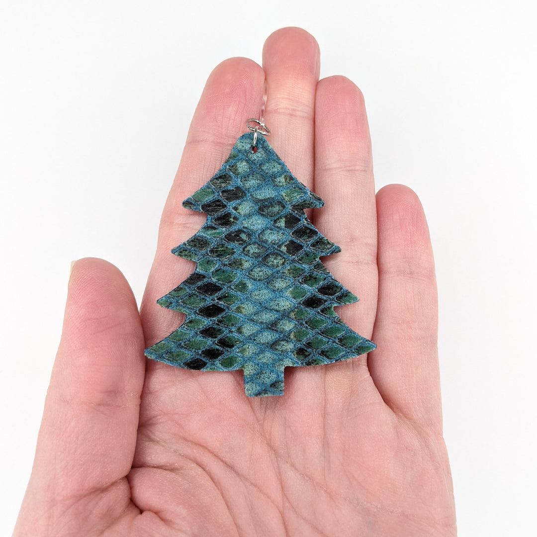 Textured Christmas Tree Earrings (Dangles) - size comparison hand