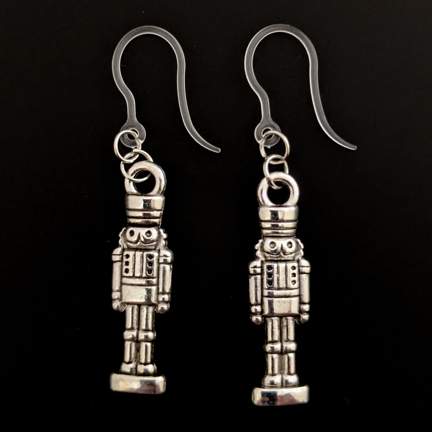 Silver Nutcracker Earrings (Dangles) - nutcracker on stand