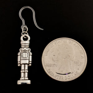 Silver Nutcracker Earrings (Dangles) - freestanding nutcracker - size comparison quarter