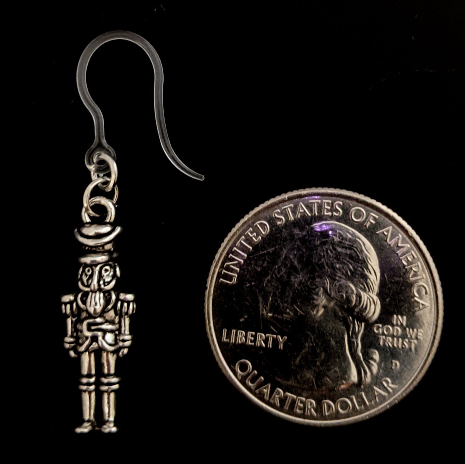 Silver Nutcracker Earrings (Dangles) - nutcracker on stand - size comparison quarter