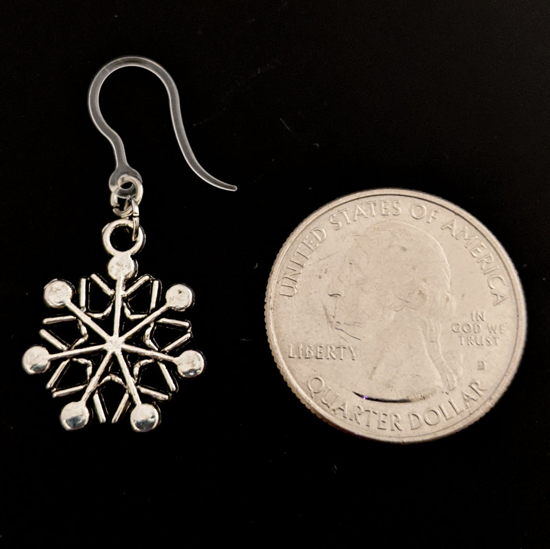 Silver Snowflake Earrings (Dangles) - size comparison quarter