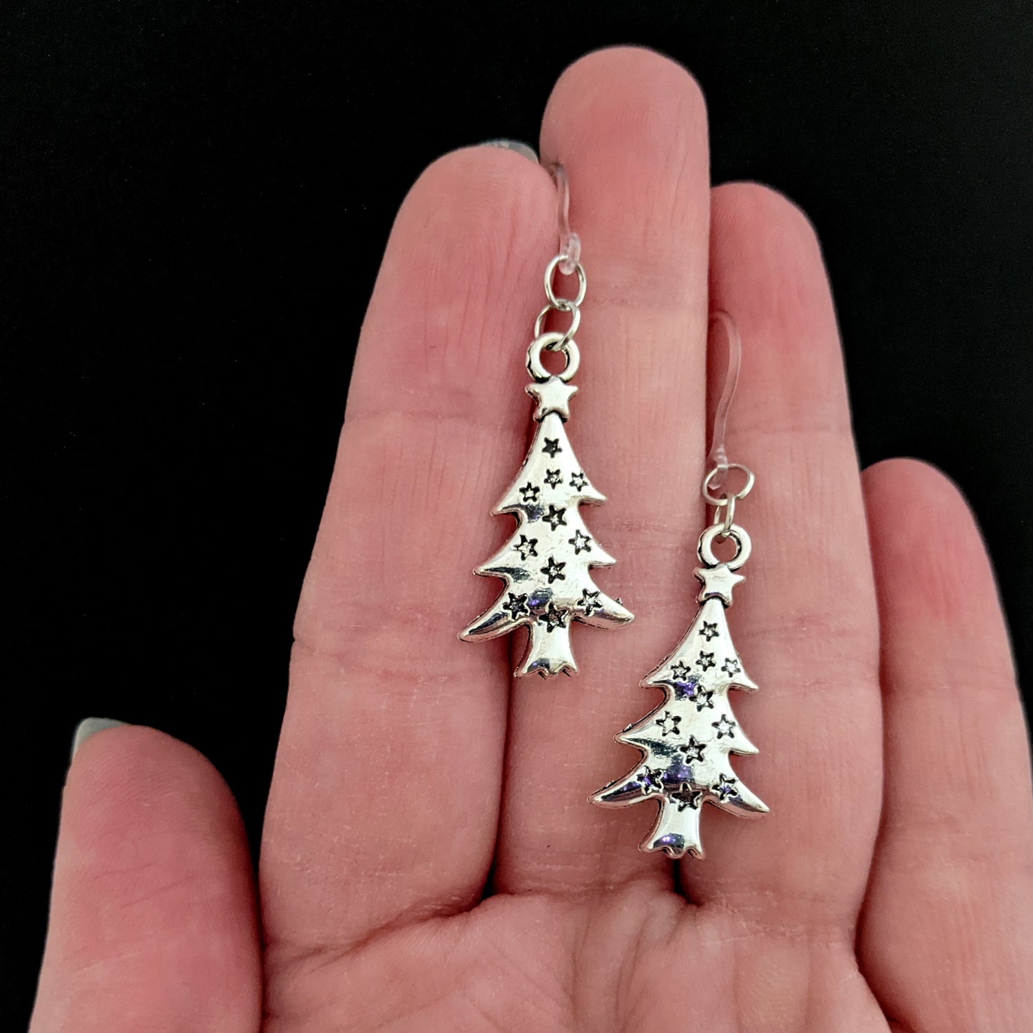 Silver Christmas Tree Earrings (Dangles) - size comparison hand