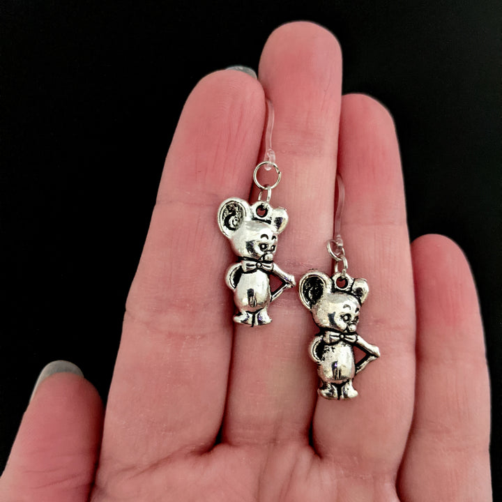 Silver Mouse King Earrings (Dangles) - size comparison hand