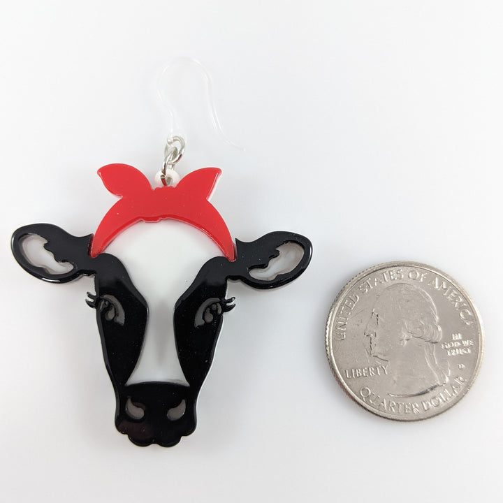 Exaggerated Heifer Earrings (Dangles) - size comparison quarter