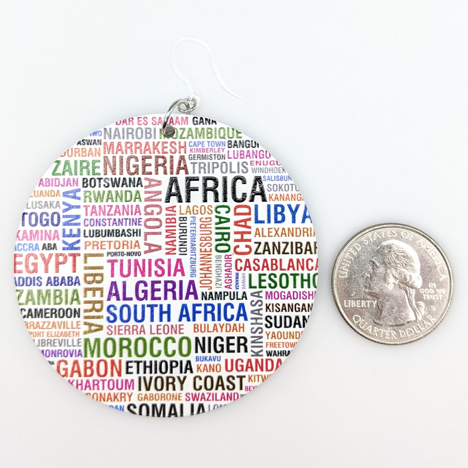 Exaggerated Wooden African City Country Earrings (Dangles) - size comparison quarter