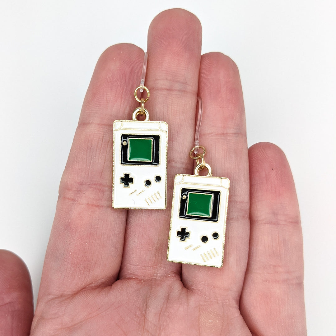 Game Console Earrings (Dangles) - size comparison hand