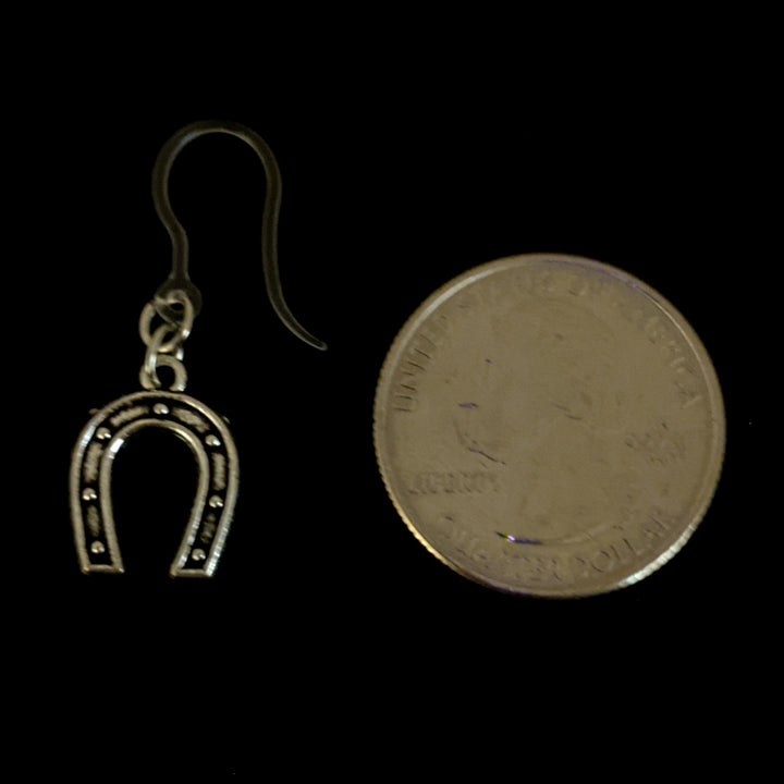 Silver Horseshoe Earrings (Dangles) - size comparison quarter