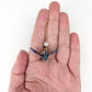 Paper Origami Crane Earrings (Dangles) - size comparison hand
