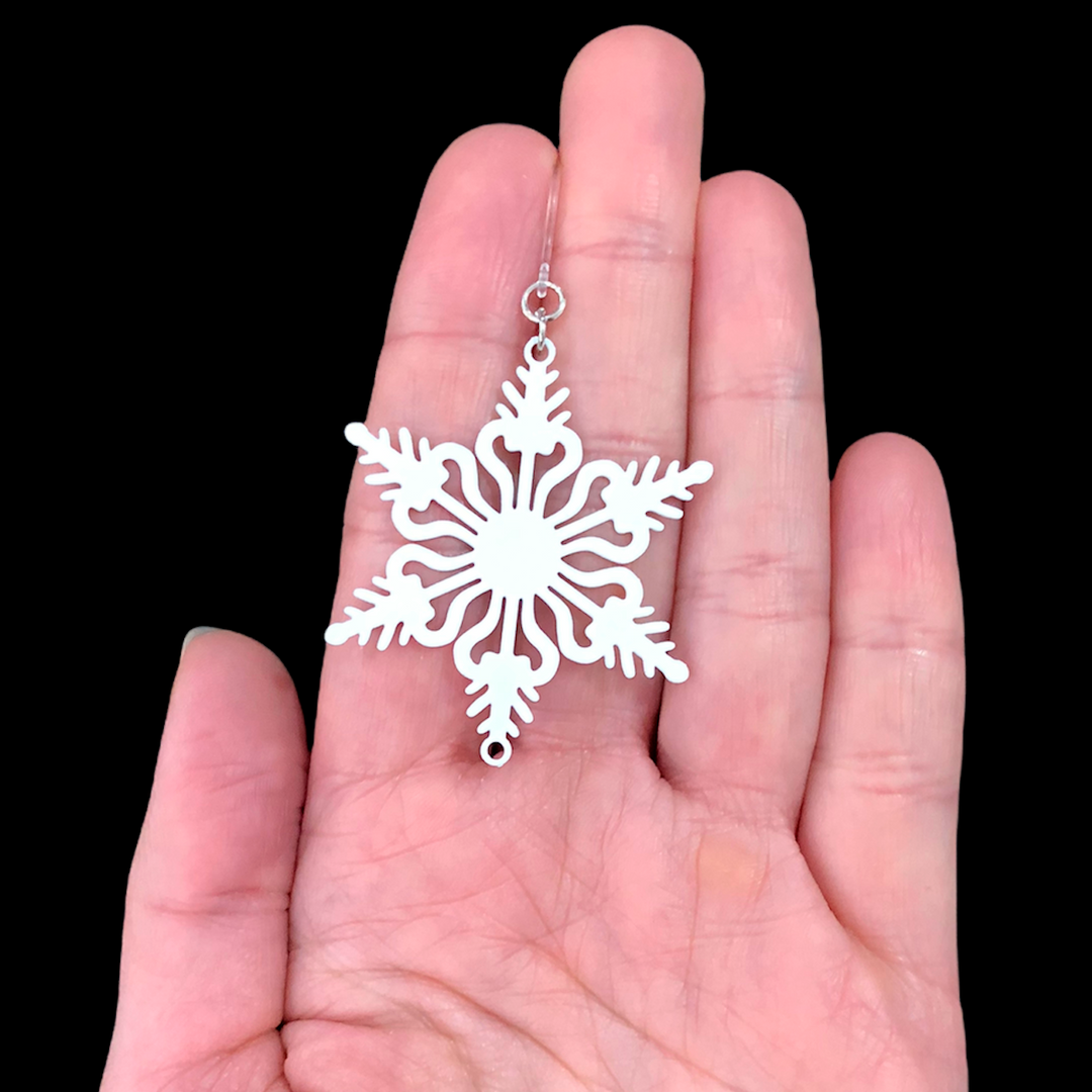 Paper Cut-Out Snowflake Earrings (Dangles) - size comparison hand