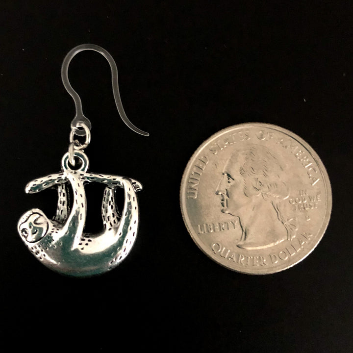 Silver Sloth Earrings (Dangles) - size comparison quarter