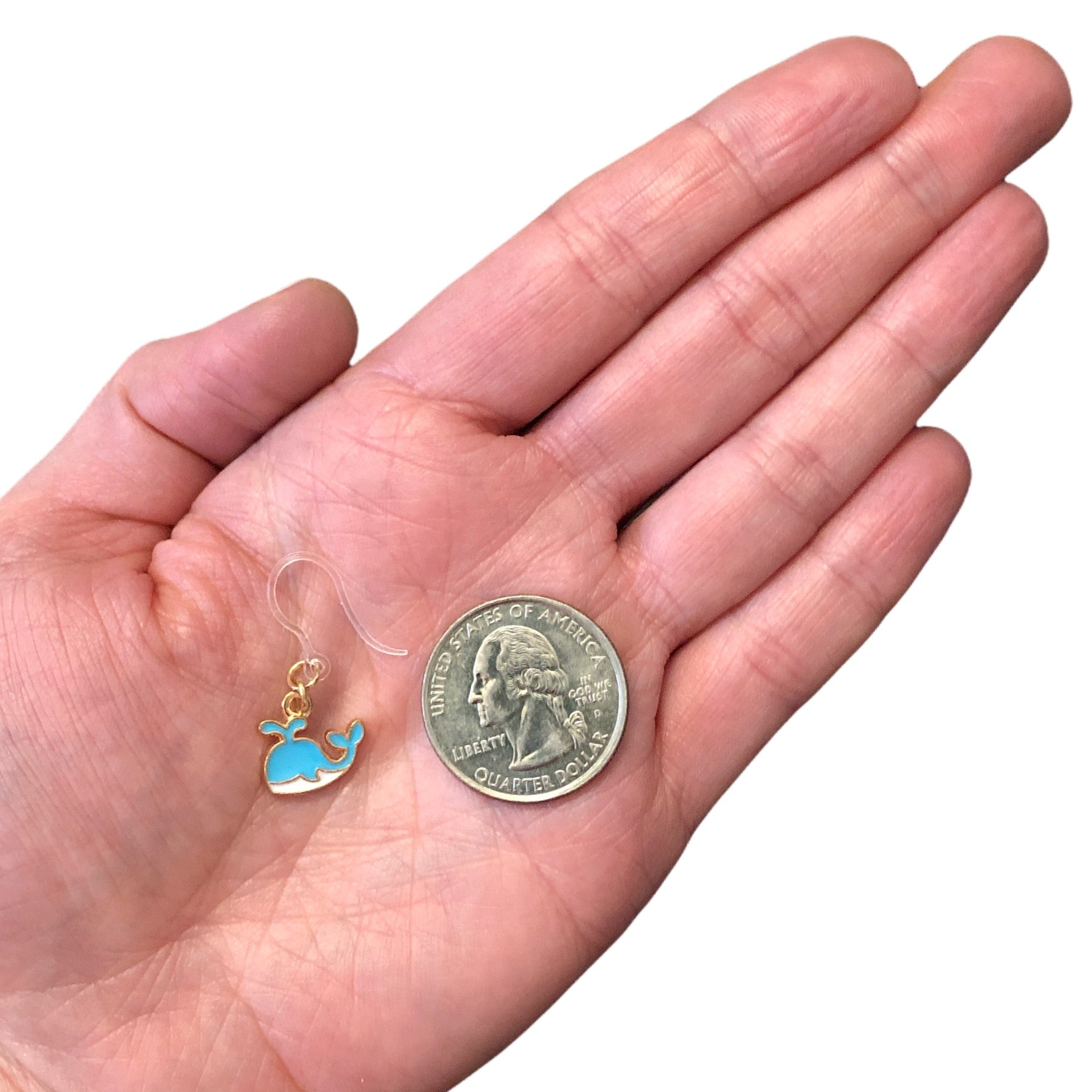 Tiny Whale Earrings (Dangles) - size comparison quarter & hand