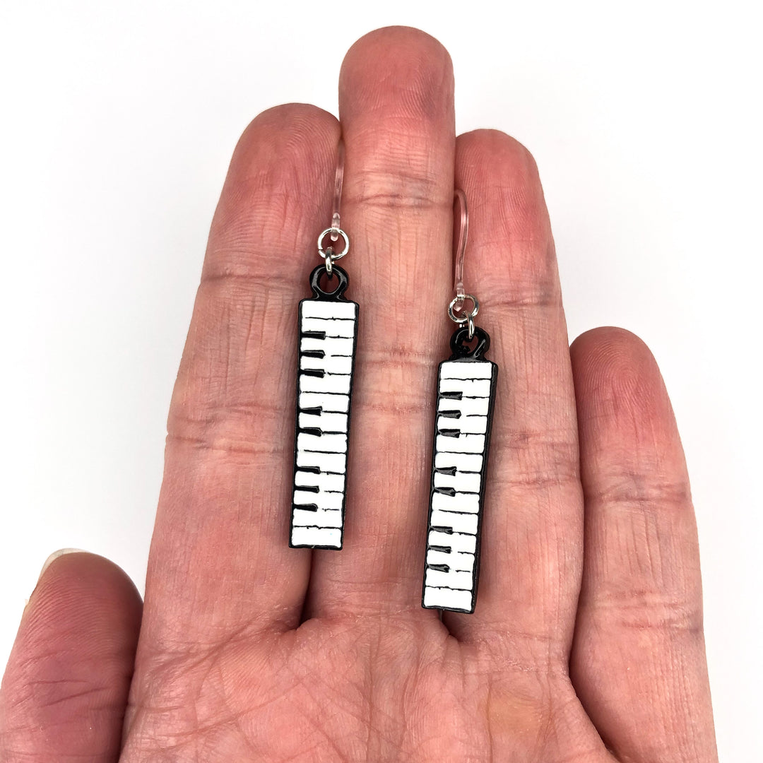 Piano Earrings (Dangles) - size comparison hand
