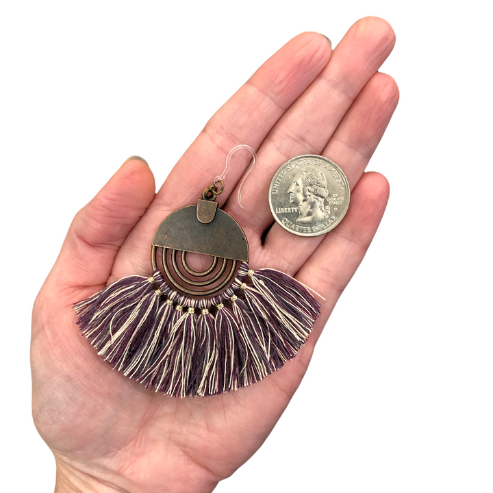 Bronze Sun Tassel Earrings (Dangles) - size comparison quarter & hand